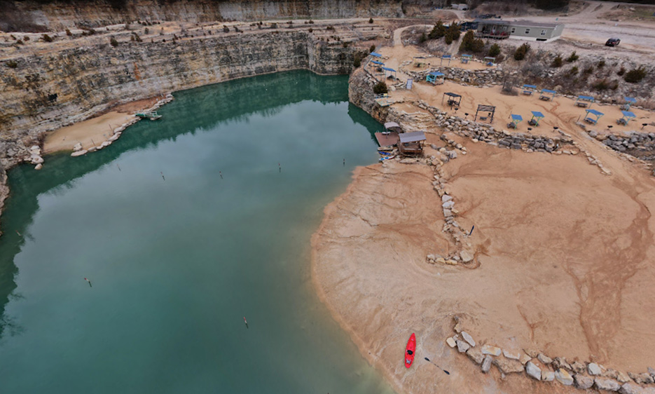 Fugitive Beach, in Missouri. This abandoned, reclaimed quarry has pumped-in water to fill it.