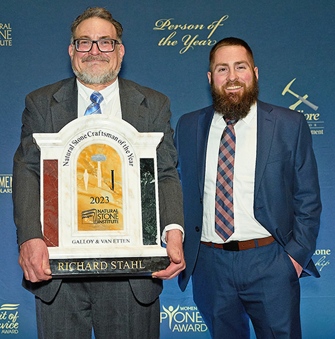 Richard Stahl (left) receives the Stone Craftsman of the Year award at TISE.