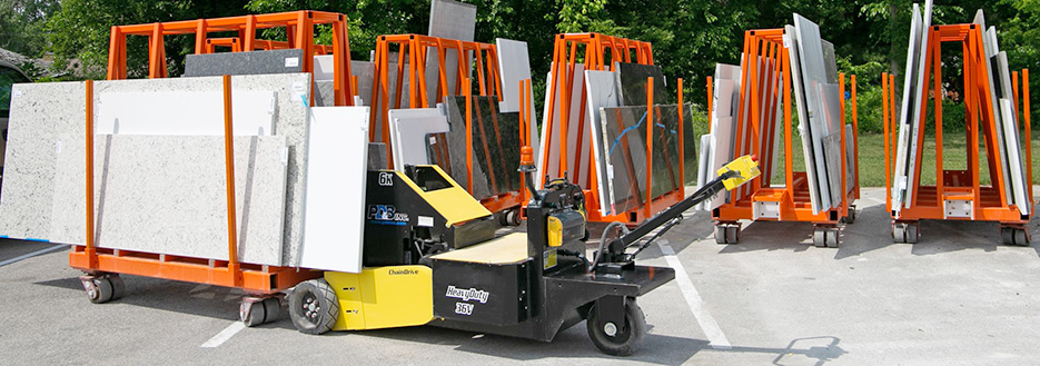 Designed to tow heavy loads, the battery-powered Slab Caddy tug is simple to operate.