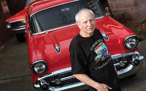 In this Tuesday, February 18, 2014 photo, Skip Wilson poses in front of his 1957 Chevrolet Bel Air that was stolen in 1984 and returned to him by the California Highway Patrol on Monday, February 17, in Clearlake Oaks, California.  Photo: Christopher Chung, AP