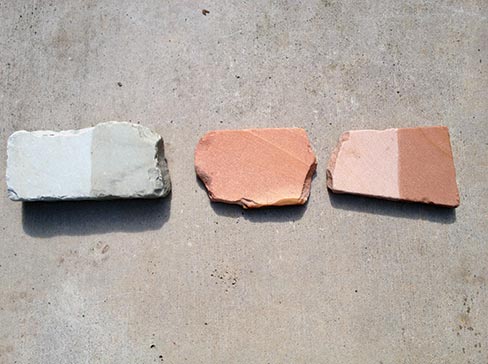 Tennessee quartzites, also called Crab Orchard Stone come in several varieties, the most well-known is the pink with reddish layers or veins. Gray is another variety. At left is shown the gray, the middle is color enhanced pink, and at right, the sample is half color-enhanced pink to show the difference.