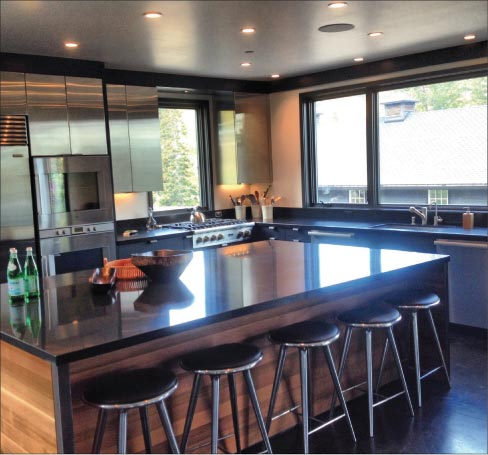 Honed Black 2cm island and counters. The owner commisioned a high end New York City design firm to design the kitchen and the rest of the home’s $1.2 million dollar remodel. “Installing the island was fun,” said Elllis. “It’s an entire slab (6 ft. wide x about 10 ft. long). It took 8 guys to pull it off.”