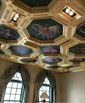 Custom coffered ceiling and murals, installed. Tradespeople from every construction discipline came together for this project.