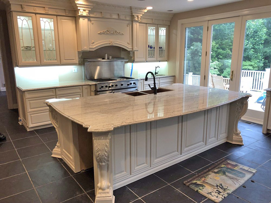 River White granite island and countertops with ogee edge for a client’s kitchen remodel.