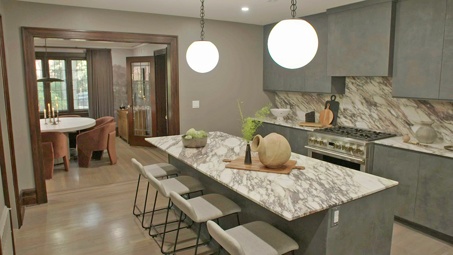 projects fabricated and installed for a Season One home featured on The Nate and Jeremiah Home Project. Marble kitchen with full-height matching marble backsplash, and matching marble fireplace surround in the adjacent family room space. 