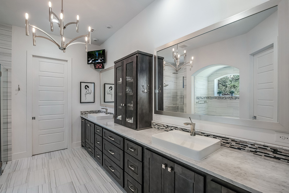 Bishop Pond master bath suite with marble double vanity, walk in shower and bathing alcove.