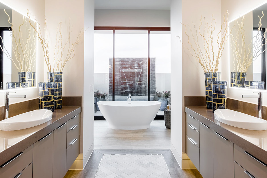 This Parade of Homes project features matching quartz counters in the spacious, light-filled concept kitchen and bath.