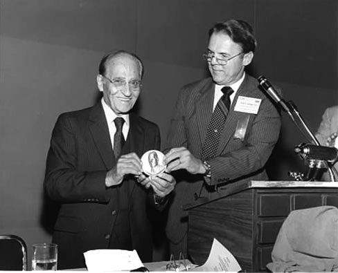 Donald V. Mariutto (pictured on left) received the Cesery Award from the TCAA in 1981 for outstanding service to the American tile industry. He was the father of Michael and Don Mariutto of Mediterranea