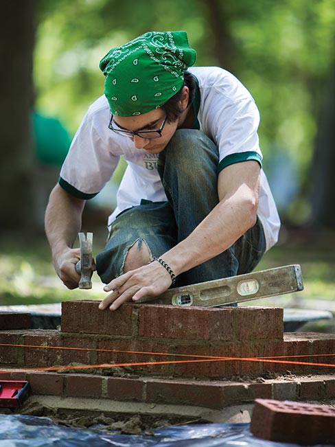 Sam Friedman doing his level best while, “Tapping the Bricks Fantastic” at the Izard exhibit. Students who enter the American College of Building Arts with dreams and goals—leave as stone and masonry tradesmen with a bright future.