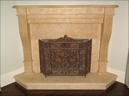 This custom designed, fabricated, & installed Jerusalem Gold fireplace surround & hearth features clean, classic lines.