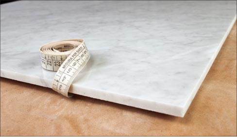 A one cm Think Thin stone Carrara panel is considerably lighter and easier to transport and install, and fabricates and polishes just the same as standard two or three cm slabs.