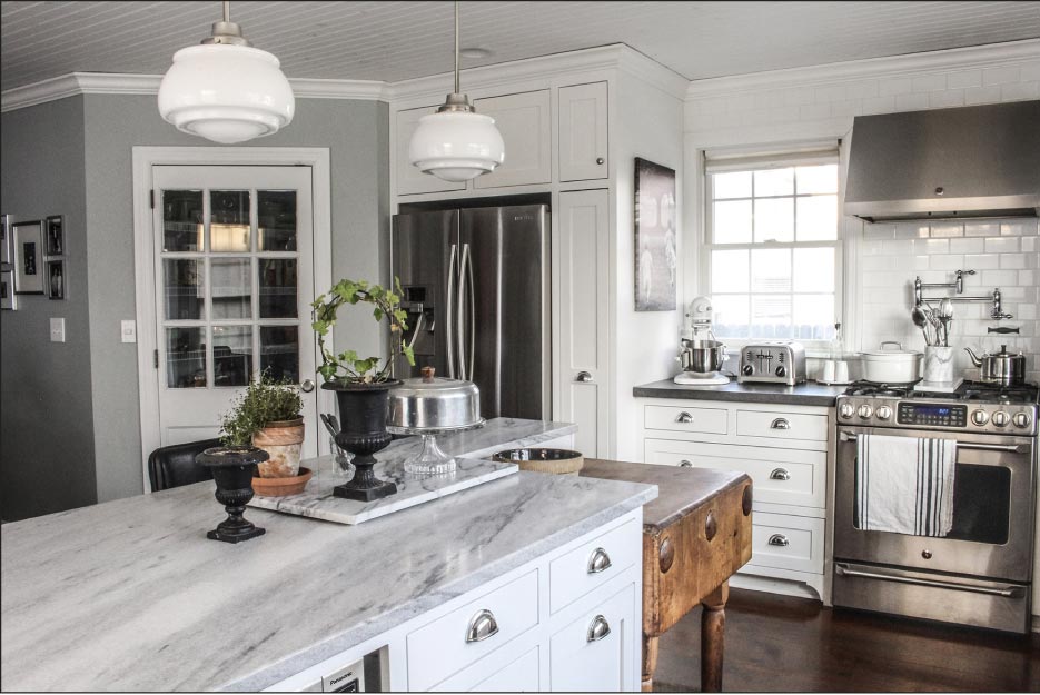 Honed White Cherokee marble is the perfect antique surface for a remodeled, modernized turn-of-the-century kitchen.