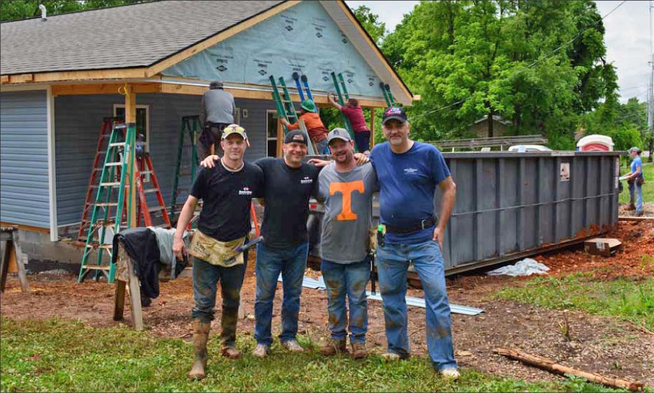 Volunteers from Braxton-Bragg at the Habitat for Humanity jobsite, from left: Matt Maples, Rick Stimac, Jeff Dykstra, Derek Brodka.