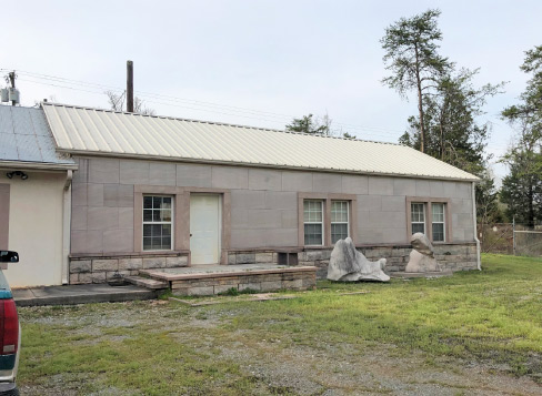 Tennessee Marble, office wing. This modest marble -clad exterior contains a wealth of beautiful and historic marble floors, trim and furnishings.