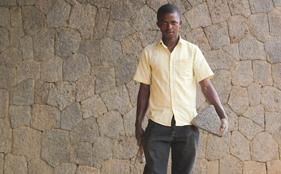 Master mason Hakizimana Emmanuel describes his experience working with the local stone. “What makes me happy? People in this neighborhood, when we meet, they tell me I have done something beautiful here. I will build my house with this stone.” 