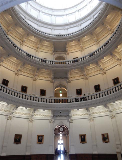 The capital rotunda inside the original capital building, also called the “whispering room,” plays host to very true-to-life portraits of past governors.