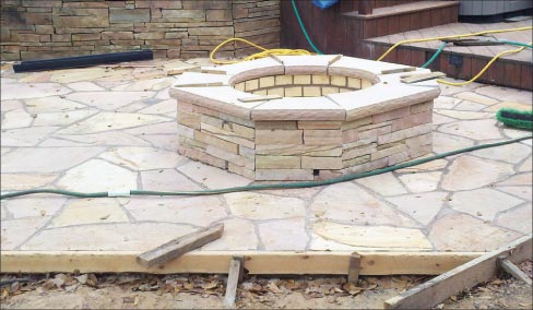 New crab orchard sandstone installation. Recommended protection with impregnator or color enhancer.