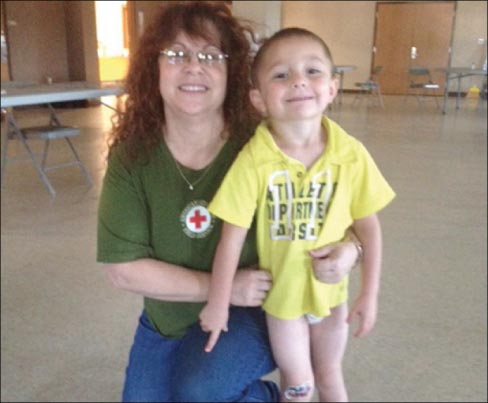 Jodi and a new friend, Carson, who waited patiently for the water to go down so he could return home.