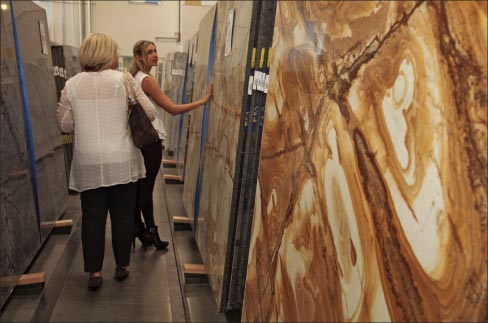 Party guests at AG&M Anaheim shop for exotic granite and marble during the grand opening reception. 