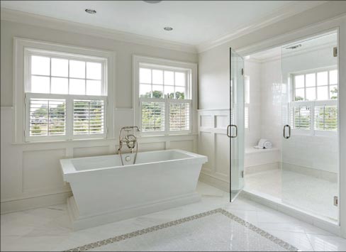 From the over-sized shower and soaker tub to the large-format Calacatta floor tiles with a glass inlay carpet, classic perfection and understated elegance is captured in the simple, clean beauty of white marble. 