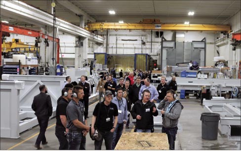 Attendees tour Park Industries at a two-day Digital Stoneworking Expo hosted by Park at its St. Cloud, MN facility.