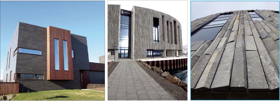 The Hof is a conference center and performing arts venue in Iceland’s vibrant northern city of Akureyri. This prominent building is a stone-clad cylinder, situated right on the harbor. Its sleek Nordic design gives a nod to local materials. Only up close do you realize the stone cladding is made of basalt columns, sliced lengthwise. Standing underneath the building and looking up reveals the shape of the columns.  This cubic, modern residence outside the capital Reykjavik is clad in honed basalt. The mirrored windows almost look like cut-outs that poke through the building to reveal the vivid blue sky behind.