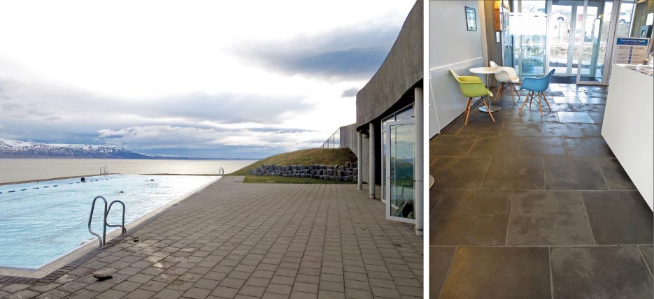 If you are wondering what the dreamiest place on Earth looks like, here it is. This infinity pool at Hofsós gazes right out into a fjord. A key distinction is that the fjord is icy cold, while the pool is geothermally hot.   The floors inside the Hofsós spa are laid with large format, honed basalt tile. The use of natural stone throughout the facility evokes the volcanic nature of the hot water.