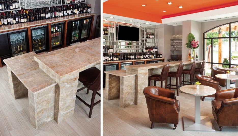 Quartzite wine bar includes matching round quartzite pedestal tables.