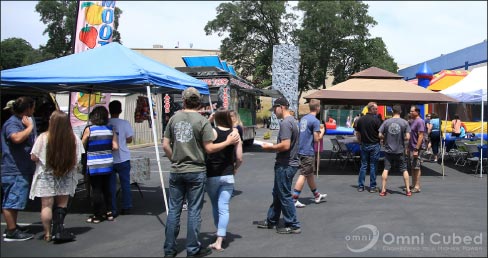 Employee appreciation picnic complete with rock wall, bounce house, and taco truck.