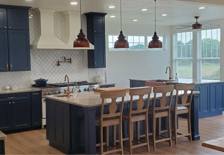 Alpha Countertops designed and installed this Leblon Quartzite kitchen for a Conway, AR retail 