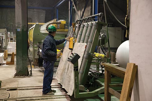 Another view of the fully-equipped underground shop processes marble from block to polished slabs and tiles.