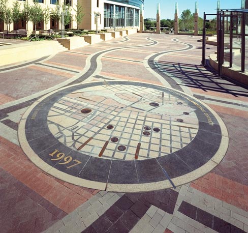 Project installed outside the Federal Reserve Building, Minneapolis, MN features a map of the city with engraved bronze plaques showing historical sites and city features.