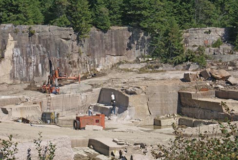 The “Heritage Valley” granite quarry, one of seven of J.C. Stone’s assets owned and operated by J.C. Stone. The quarrymen are prepping the diamond-tipped wire to cut through the ledge to pull out a day’s worth of blocks. 