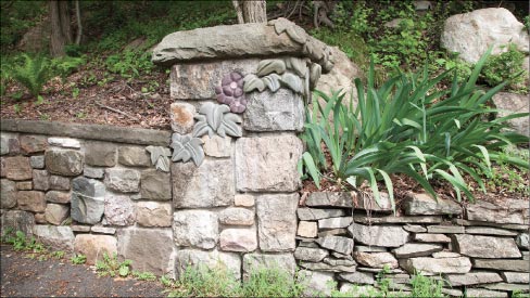  “This is a new concept where I put carved elements into the wall,” explained Mike. “I’m trying to integrate carved elements into stone walls. I see me doing more of it. It’s a nice concept.”