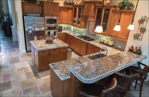 The Persian Treasure kitchen includes a separate wet bar and bar top that continues the laminated ogee edge theme.