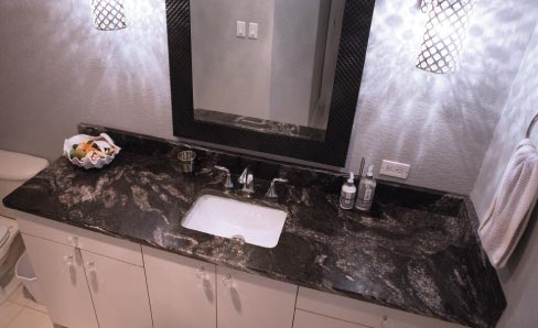 The 3cm Black Atacama granite used on this vanity is another challenging material – getting profile gloss to match the top.