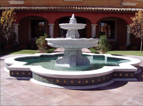 Fountain coping fabricated by Ngima, produced from laminated 2cm ogee and 3cm demi bullnose marble, to complement the client’s imported Italian marble fountain.