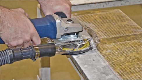 Surface grinding typically produces significant dust in shop. The Ecoguard shroud and vacuum dust collection system developed by Alpha® offers a solution to meet strict OSHA regulations.