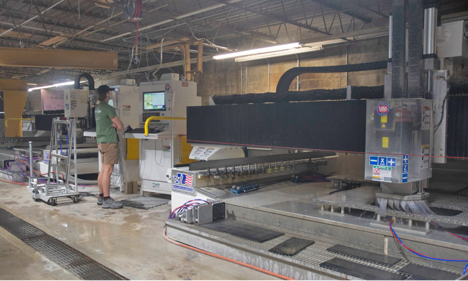 Northwood CNC Router polishes the inside edges of a double sink cutout in this granite island.