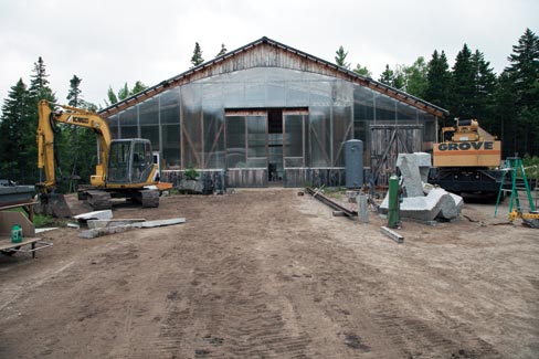 This wide shot shows the extensive use of double cell polycarbonate glass for the shop, while a yard full of Big Boys Toys stand ready for any large or small placement of stone, be it sculpture or landscape. Soon, according to Jesse, there will be railroad tracks leading into the shop to facilitate the in and out of large scale projects.