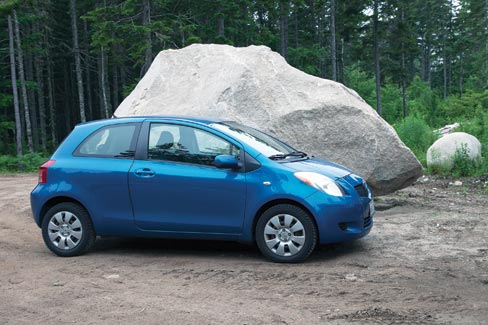 No handy yardstick was available to show the scale of this immense 67,000 lb. boulder, so this compact car was used instead.