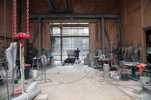 Inside the polycarbonate glass shop: Even on an overcast day, the expansive use of glass brings light from all directions, ensuring no shadow effects on the work and creating the perfect environment for the discriminating artist.