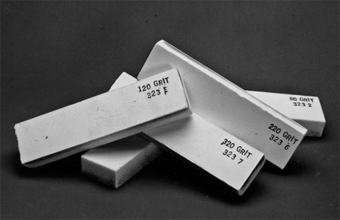 Aluminum Oxide abrasive bricks like the ones Bob helped make in his youth were still commonplace stone fabrication tools well into the 1990s.