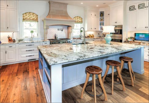 Delicatus White Island and Ceramic Tile – Stone Creek says its customers continue to gravitate towards painted cabinets and lighter granites and marbles with simple ceramic tiles, as seen in this light-filled, newly constructed home in Knoxville, Tennessee.