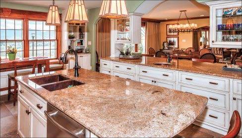 This kitchen is in a Frank Lloyd Wright house design where the customer used Juparana Tier along with other varieties of natural stone to update the entire house.