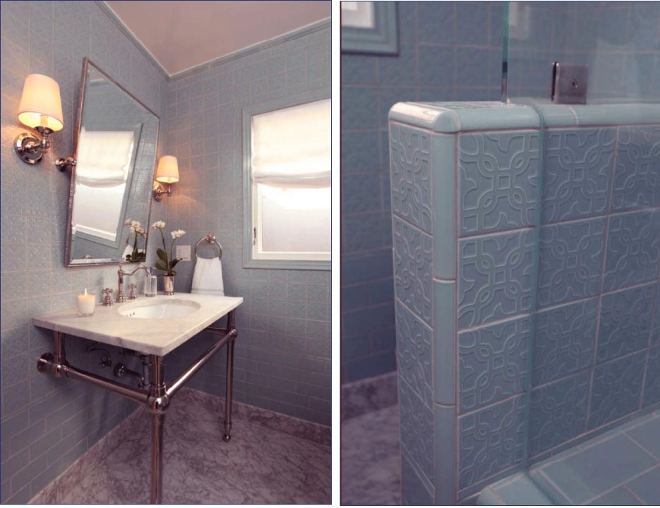 The drama of this gorgeous powder room is the floor-to-ceiling colored decorative tile. A simple subway tile begins at the bottom giving way to the embossed 4 x 4 inch tiles which are capped off at the ceiling by a decorative liner and cornice piece. Carrara vanity top and floor provide a nice compliment to blue tile.