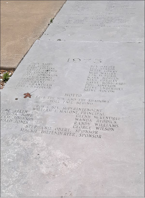 Laid as a pavement in front of the high school, engraved slabs of Fleuri cut Phenix marble record decades of senior grads, teachers and sponsors.