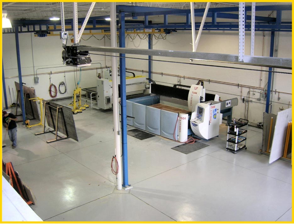 Compared to a full shop, the Percoco operation only needs a modest footprint, and two stone workers to process slabs.