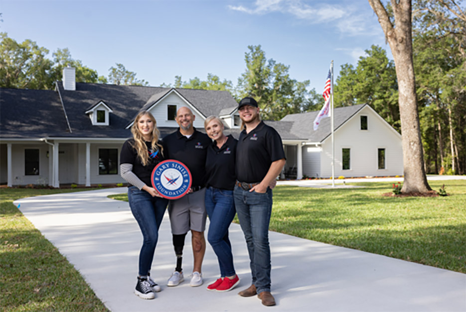 US Army First Sergeant (ret.) John Borders with wife  Mollie, daughter Brittany and son Zander.