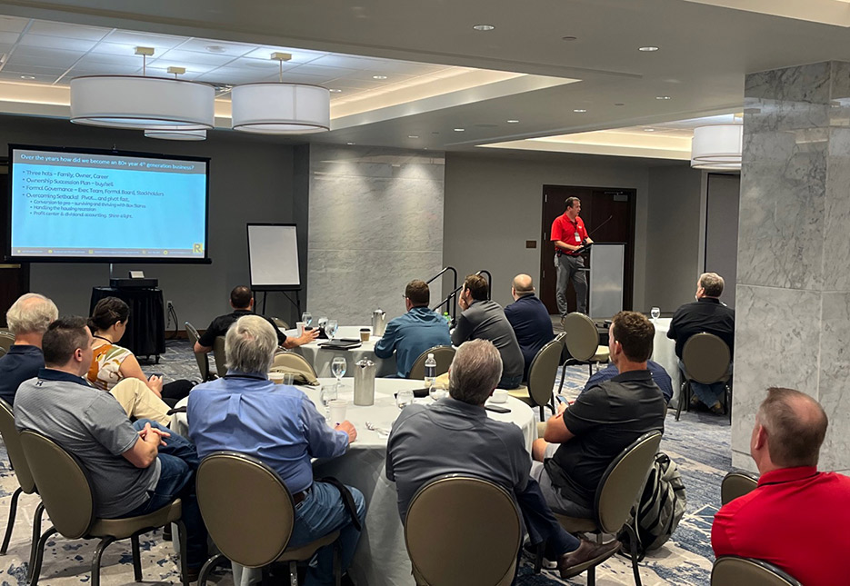 Inspiration in Action: Attendees engaged in the presentation given by Patrick Goebel, CEO of Star Lumber, as he unveils the journey behind his empire’s remarkable rise.